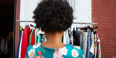 Woman shopping for vintage clothes
